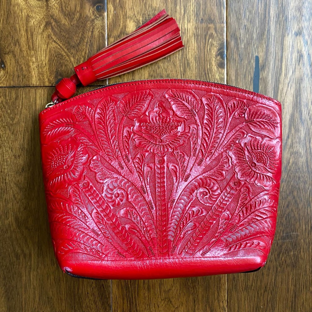 Carolina Crowley red clutch bag Mexican tooled leather tassel